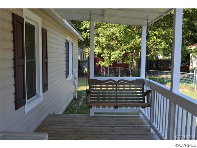 15804 Tri Gate Road Chester, VA 23831 - Photo 3 of 13 a view of balcony with wooden floor