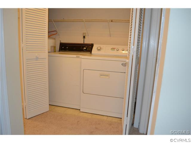 15804 Tri Gate Road Chester, VA 23831 - Photo 9 of 13 a utility room with dryer and washer