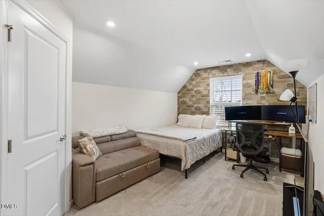 a bathroom with a sink a toilet and shower curtain