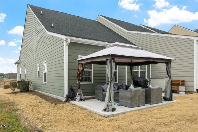 a front view of a house with patio