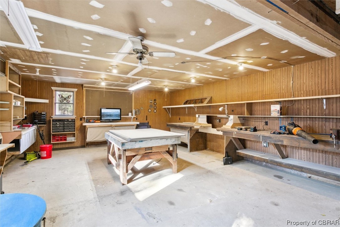 3255 Providence Road Hayes, VA 23072 - Photo 29 of 46 Heated workshop area and ceiling fan.