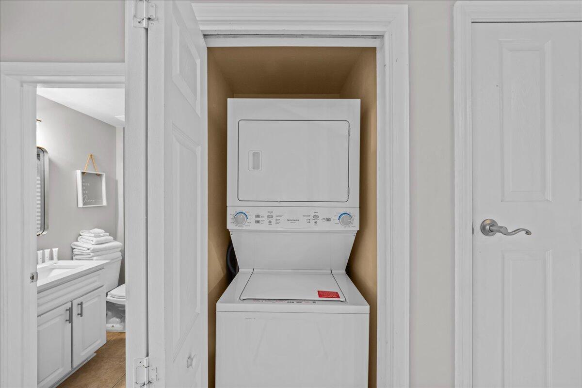 104 Village Boulevard, Unit 625 Santa Rosa Beach, FL 32459 - Photo 19 of 38 a utility room with dryer and washer