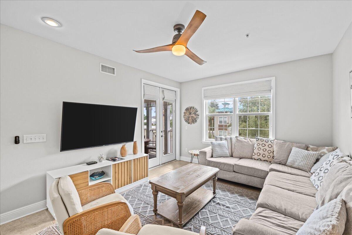 104 Village Boulevard, Unit 625 Santa Rosa Beach, FL 32459 - Photo 6 of 38 a living room with furniture and a flat screen tv