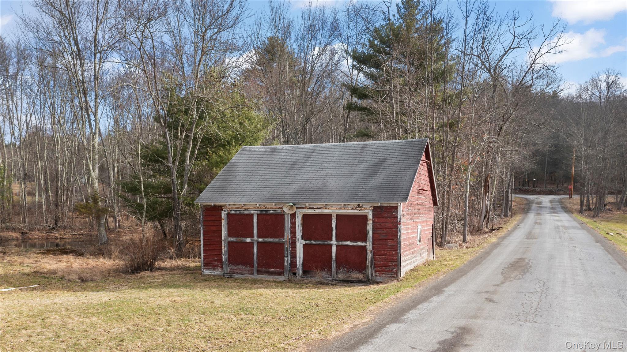 700 Mettacahonts Road Accord, NY 12404 - Photo 29 of 47 a view of a house with a yard and garage