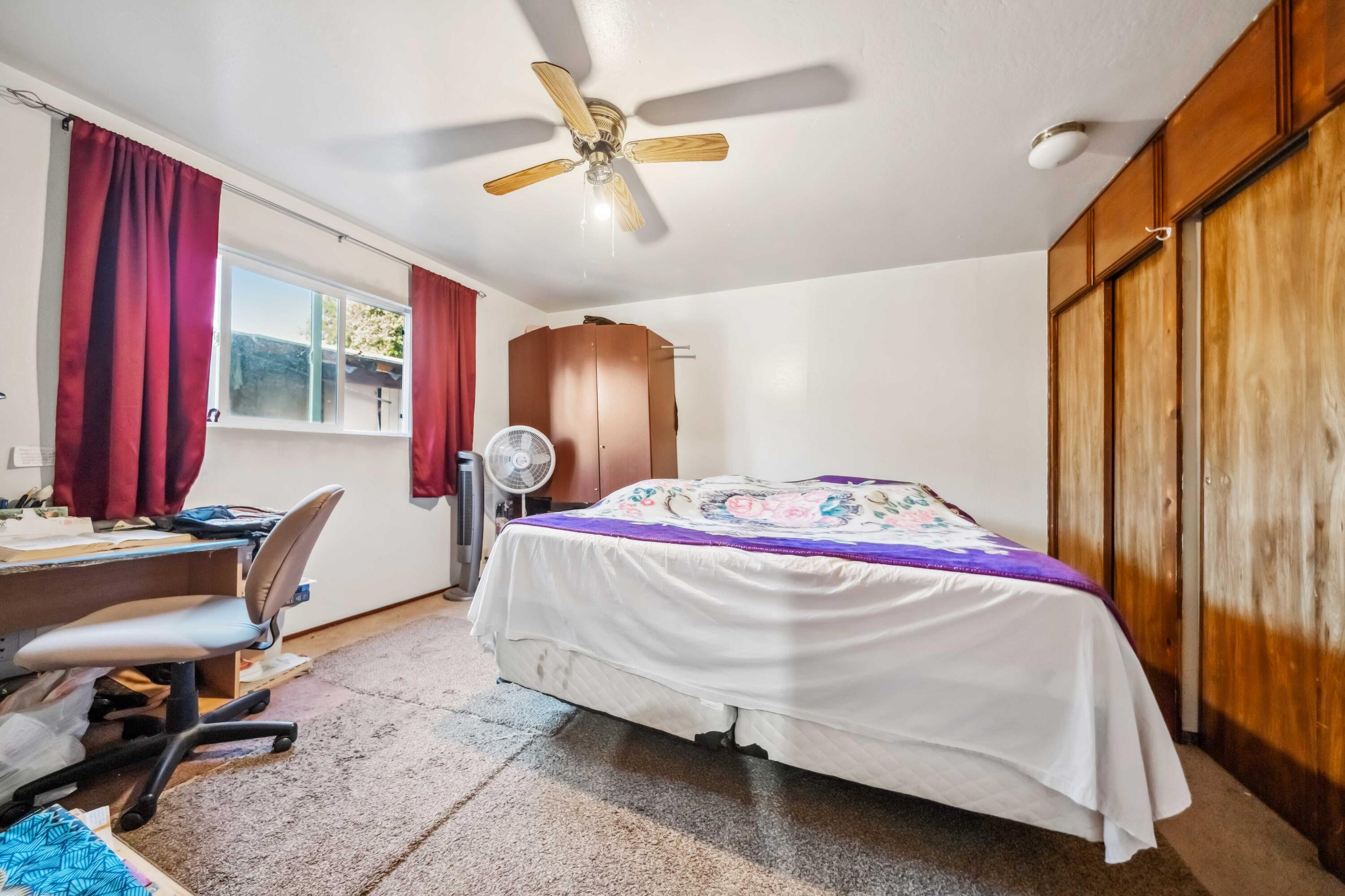 5450 Cedars Road Redding, CA 96001 - Photo 11 of 21 a bedroom with a bed and a table