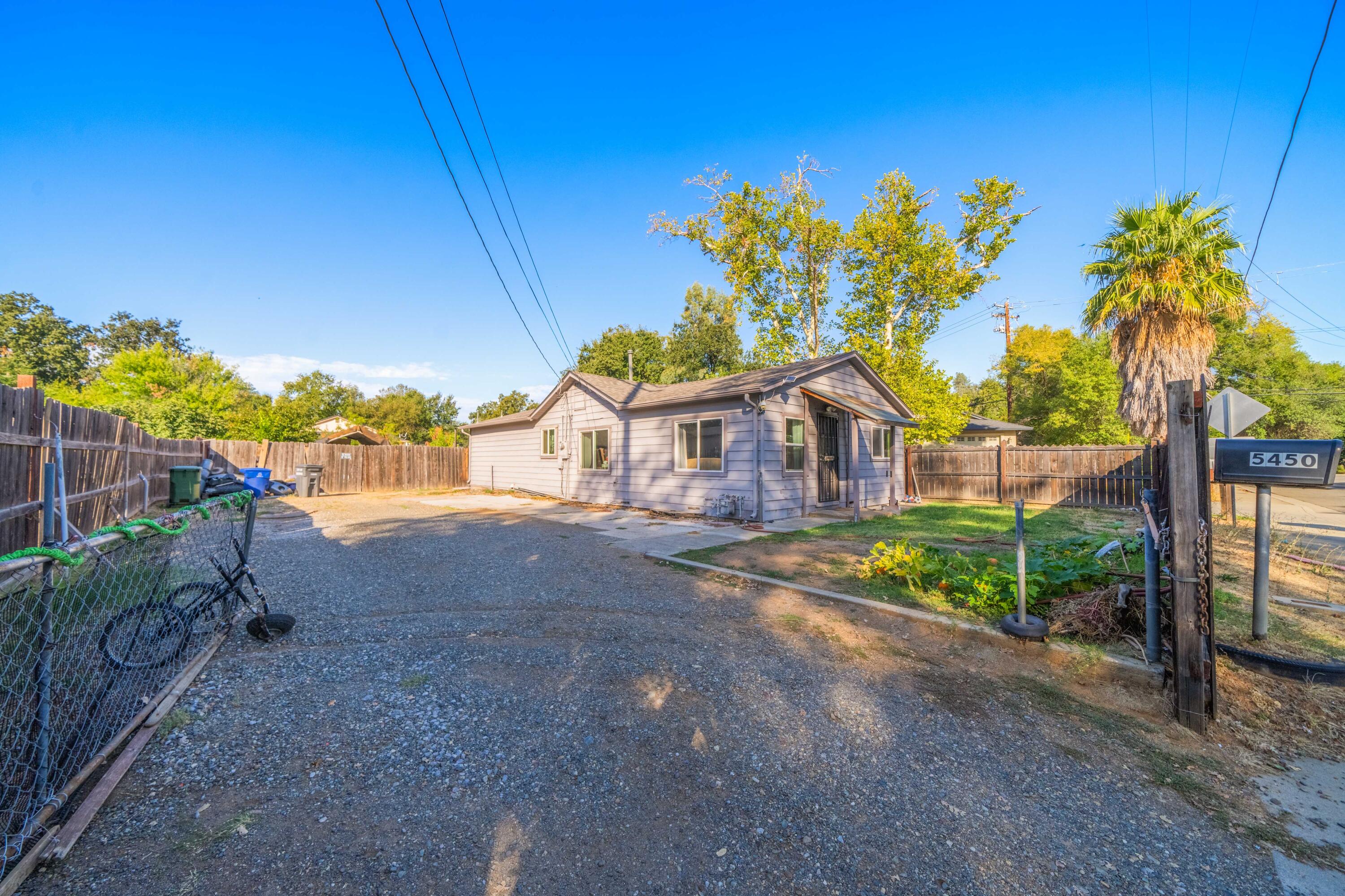 5450 Cedars Road Redding, CA 96001 - Photo 21 of 21 a house view with a garden space