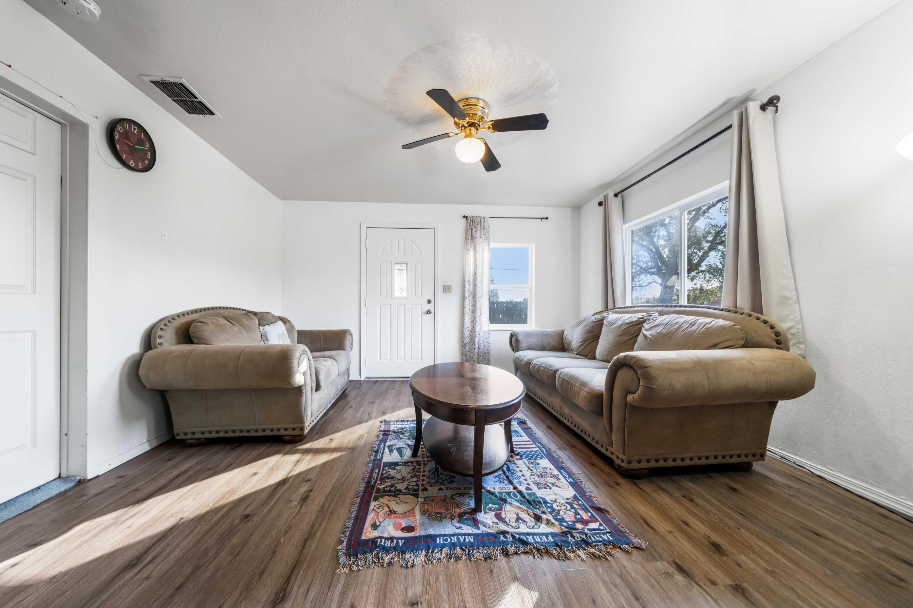 5450 Cedars Road Redding, CA 96001 - Photo 4 of 21 a living room with furniture and a rug