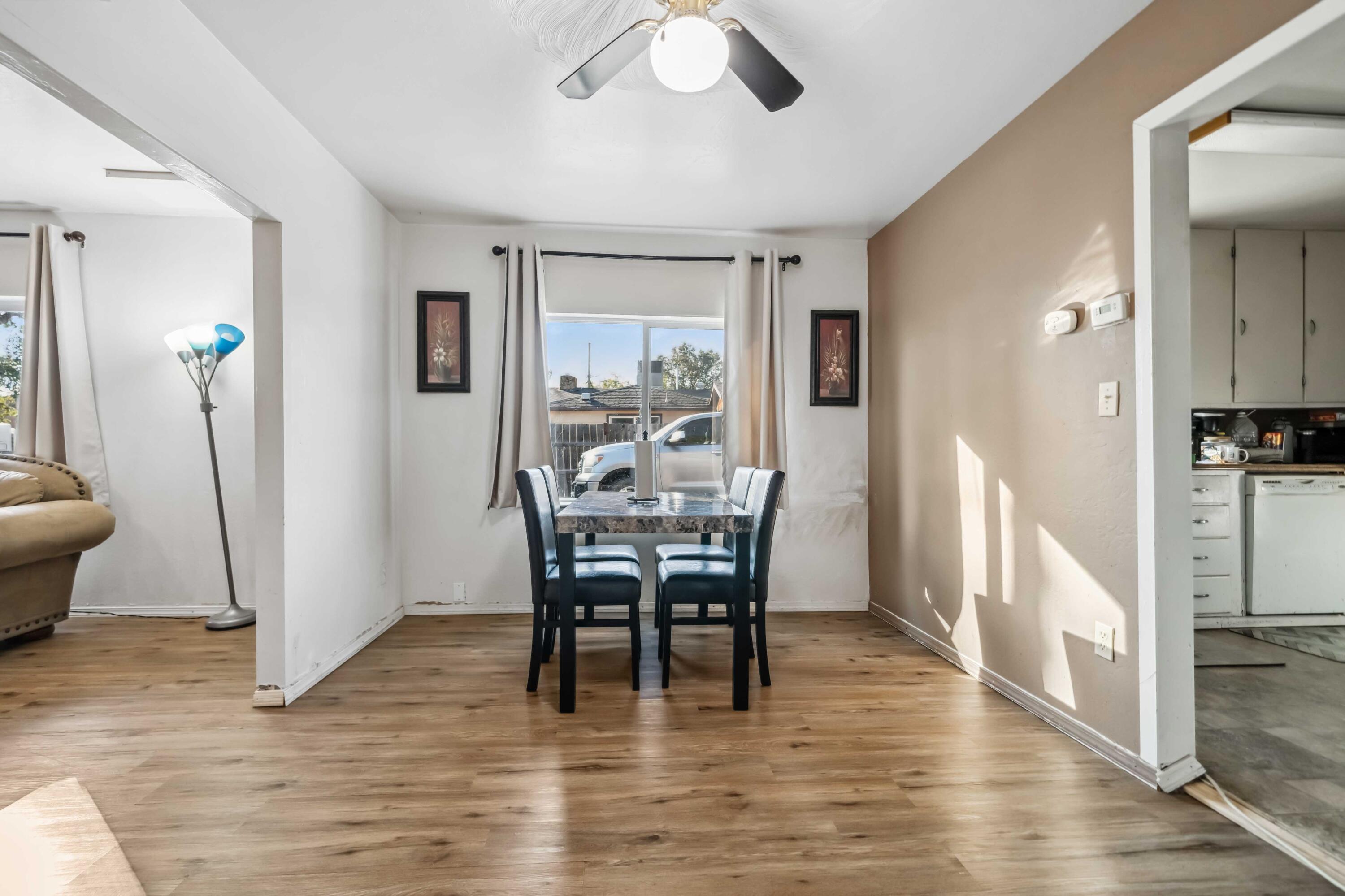 5450 Cedars Road Redding, CA 96001 - Photo 6 of 21 a view of a dining room with furniture and wooden floor