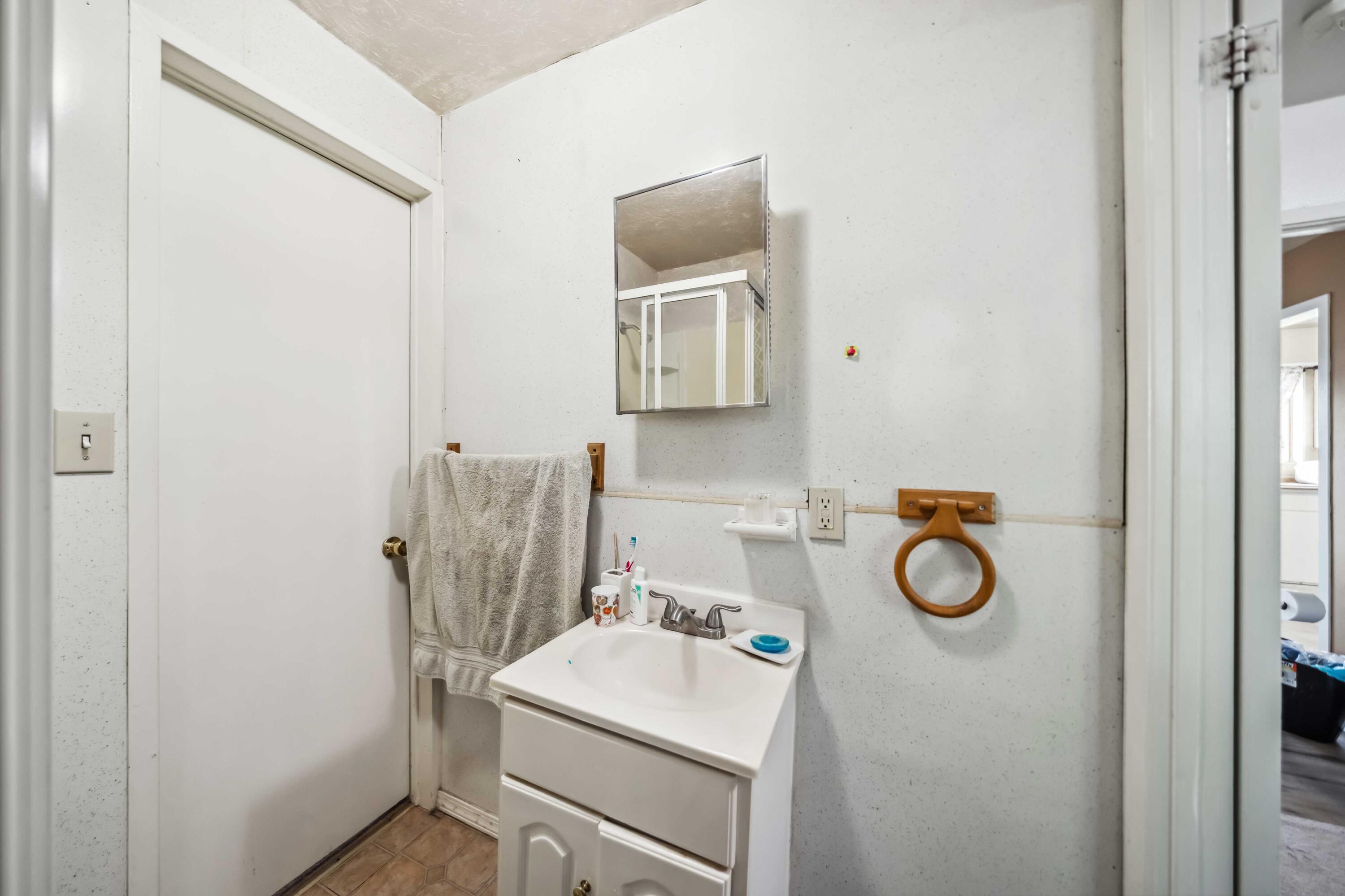 5450 Cedars Road Redding, CA 96001 - Photo 9 of 21 a bathroom with a sink toilet and vanity