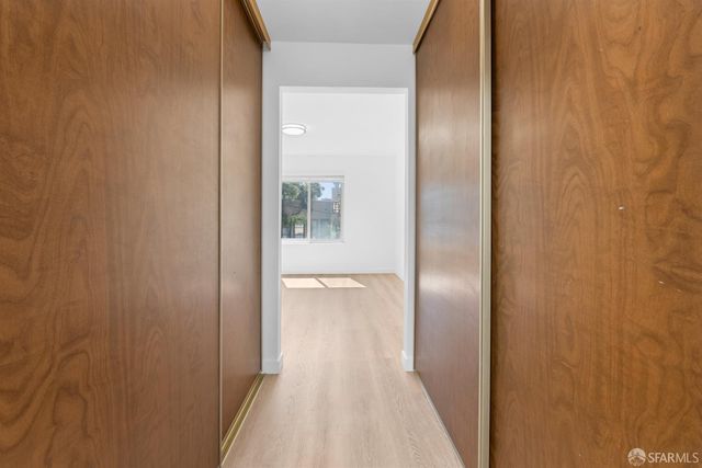 a bathroom with a granite countertop sink a toilet and bathtub