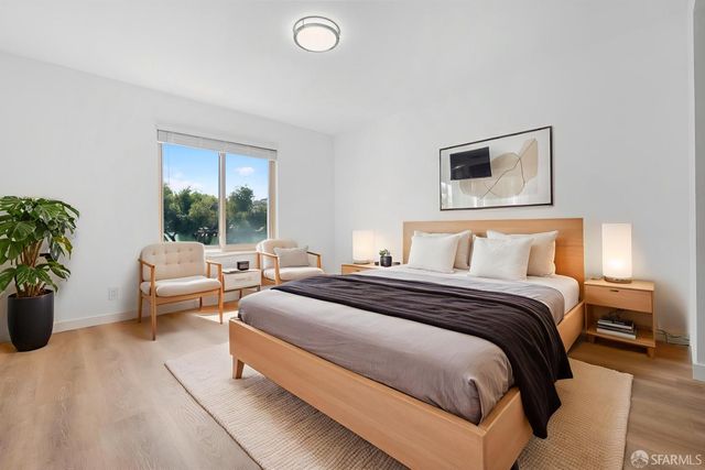 a bathroom with a tub and a sink