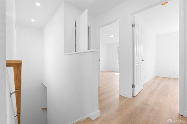 a living room with furniture a table and a large window