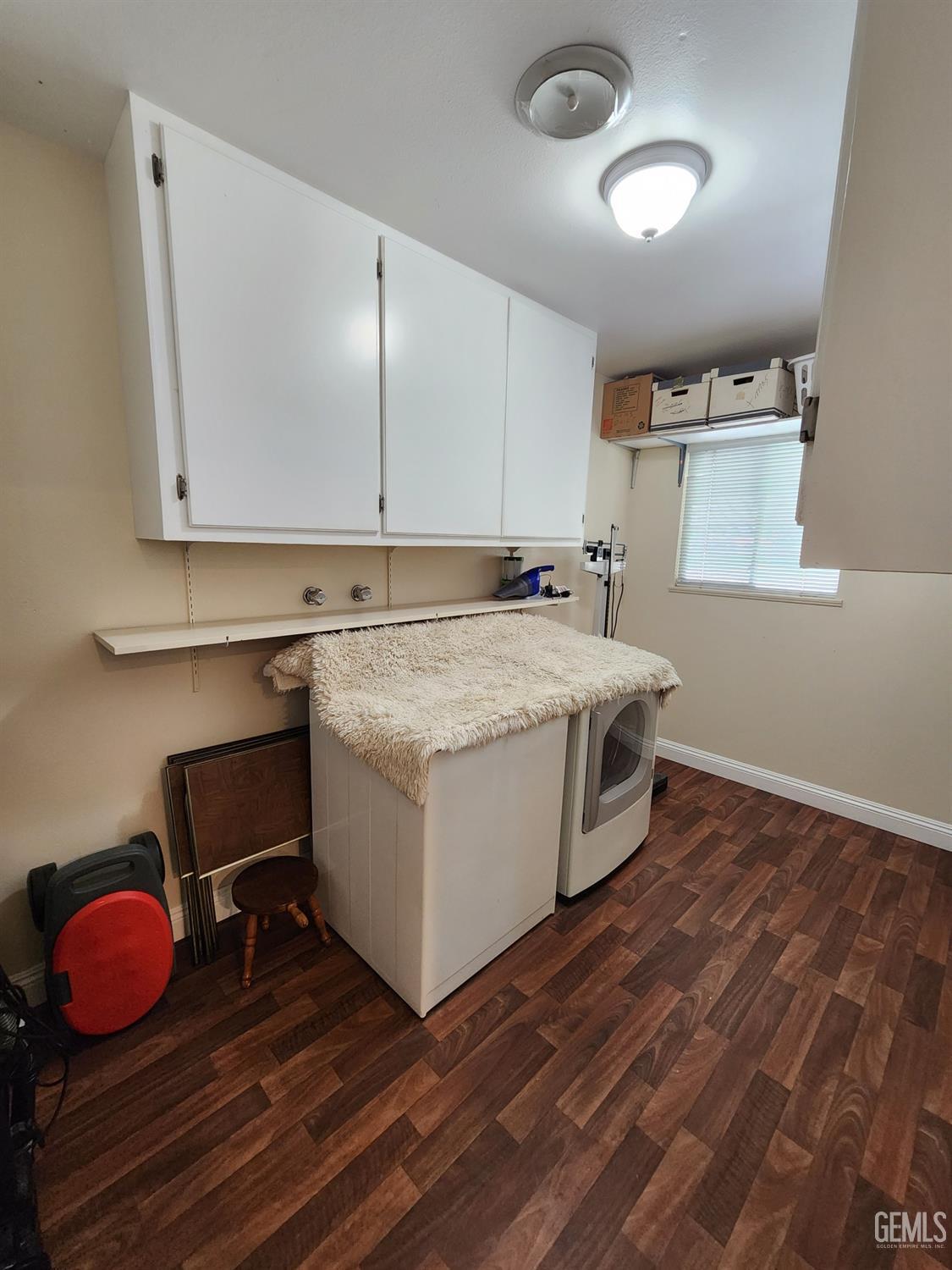 Undisclosed Address Bakersfield, CA 93309 - Photo 14 of 22 a room with a sink and cabinets