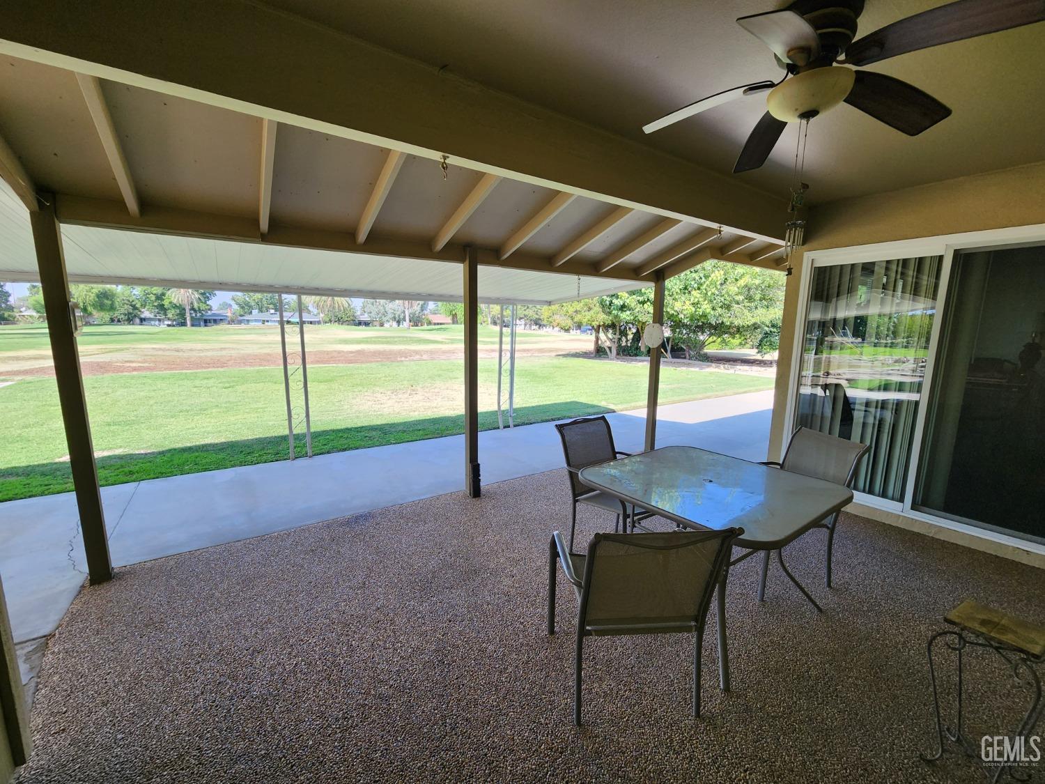 Undisclosed Address Bakersfield, CA 93309 - Photo 15 of 22 a dining room with furniture and a floor to ceiling window