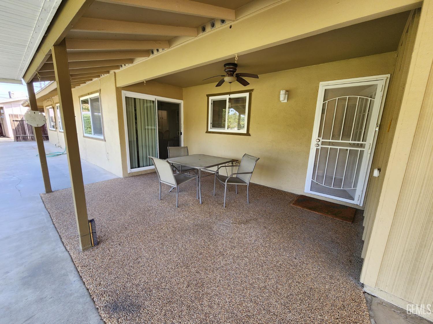 Undisclosed Address Bakersfield, CA 93309 - Photo 16 of 22 a view of an empty room with wooden floor and a window