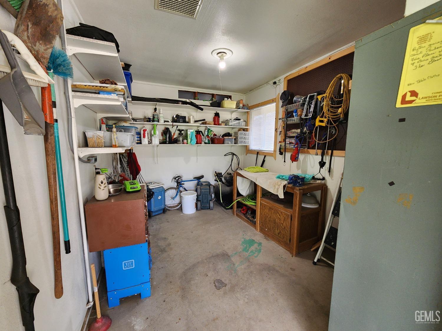 Undisclosed Address Bakersfield, CA 93309 - Photo 18 of 22 a room with storage and utility