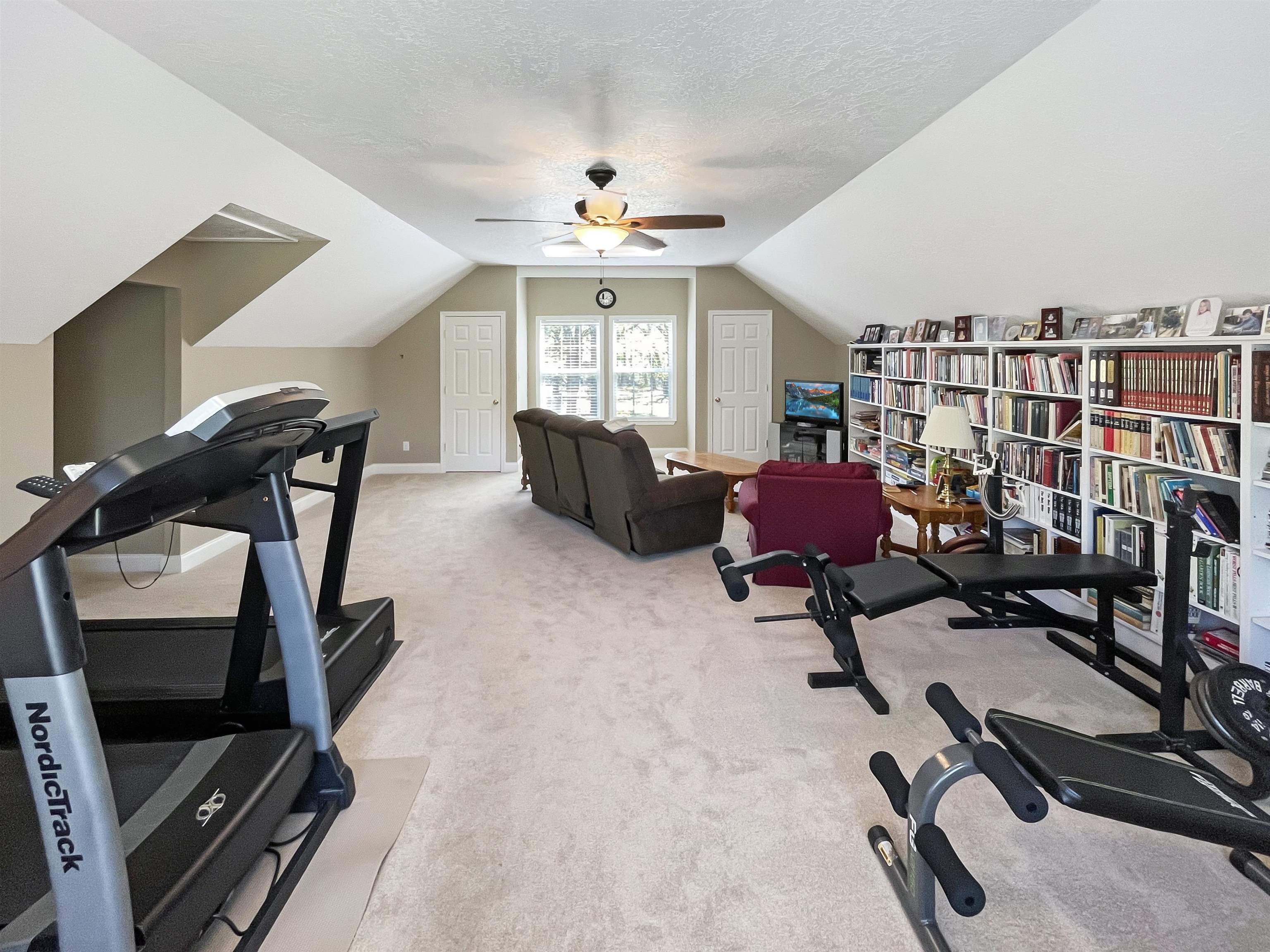 201 Cannon Road Ripley, TN 38063 - Photo 6 of 20 a living room with furniture gym equipment and a window