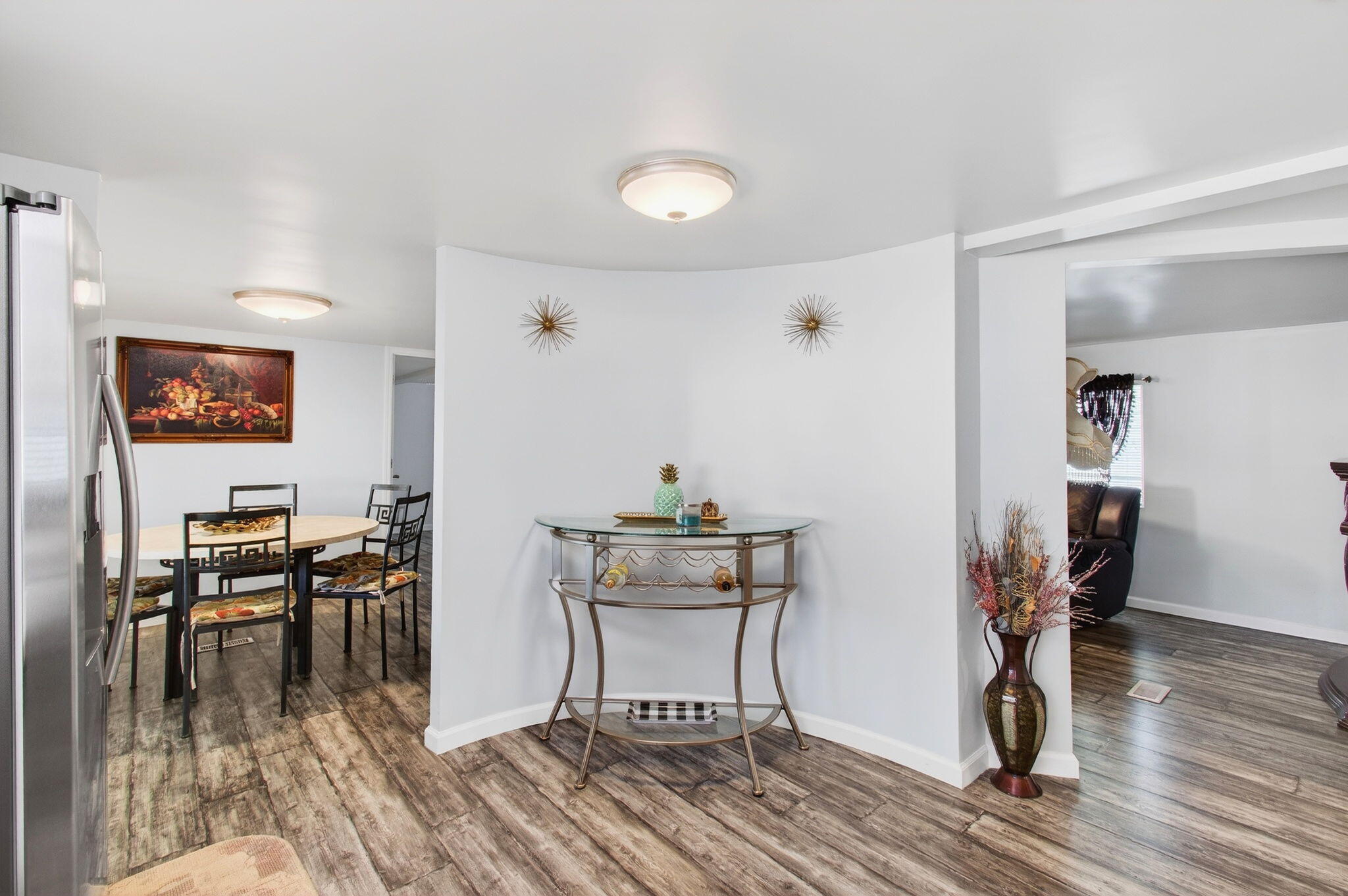 22849 Tradewind Road Boca Raton, FL 33428 - Photo 18 of 60 a work room with furniture and wooden floor