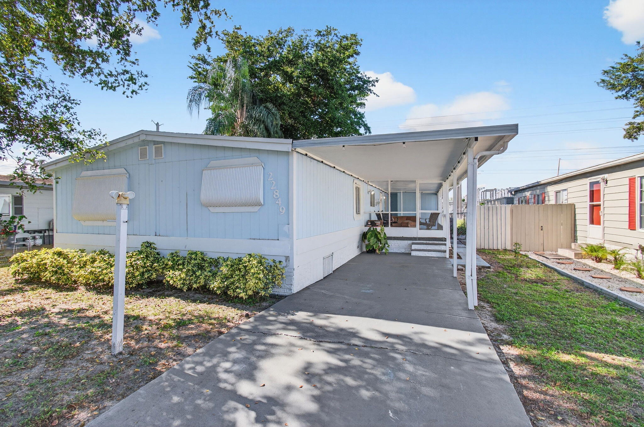 22849 Tradewind Road Boca Raton, FL 33428 - Photo 2 of 60 a view of a back yard of the house