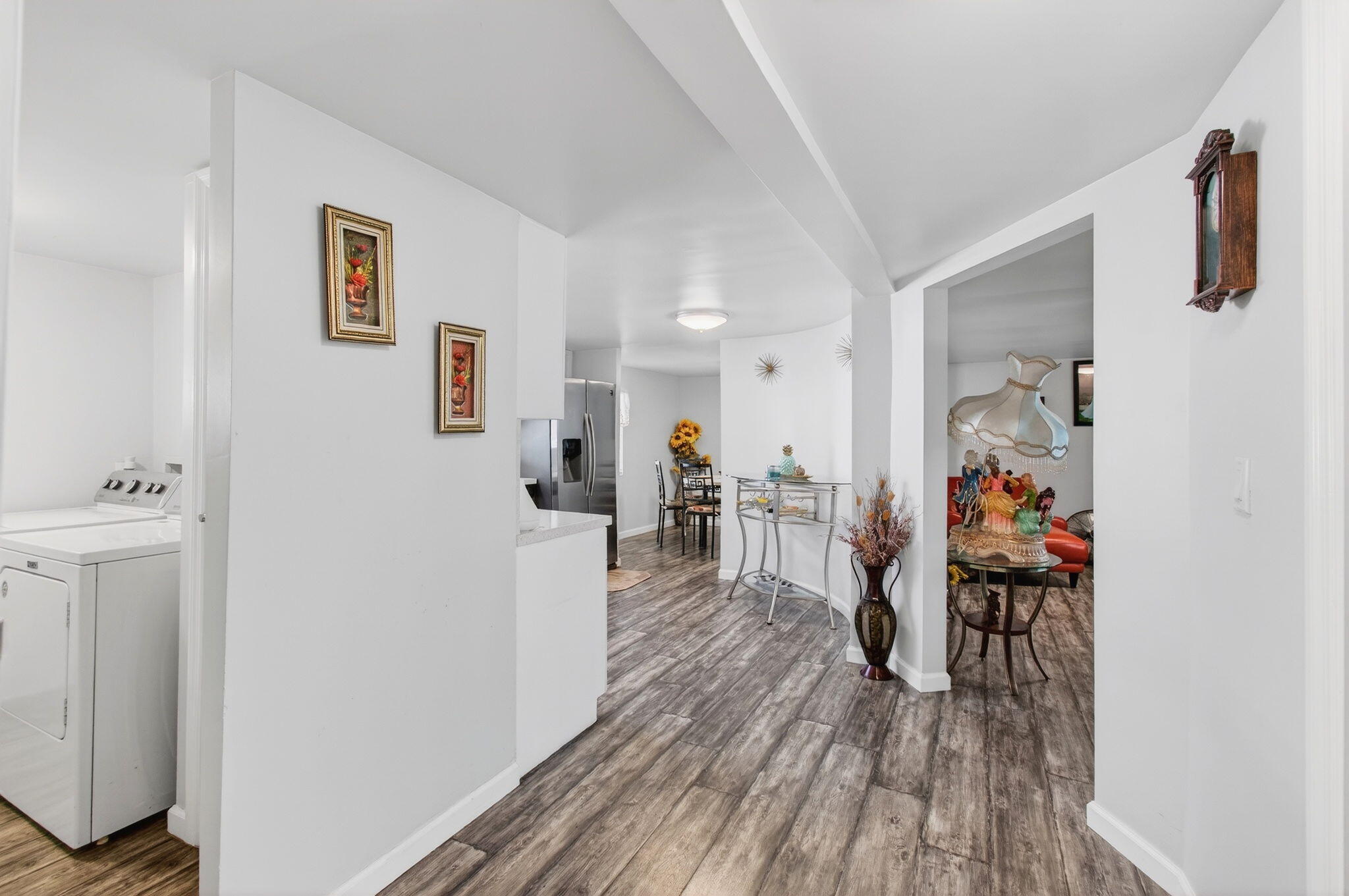 22849 Tradewind Road Boca Raton, FL 33428 - Photo 23 of 60 a view of a hallway with furniture and wooden floor