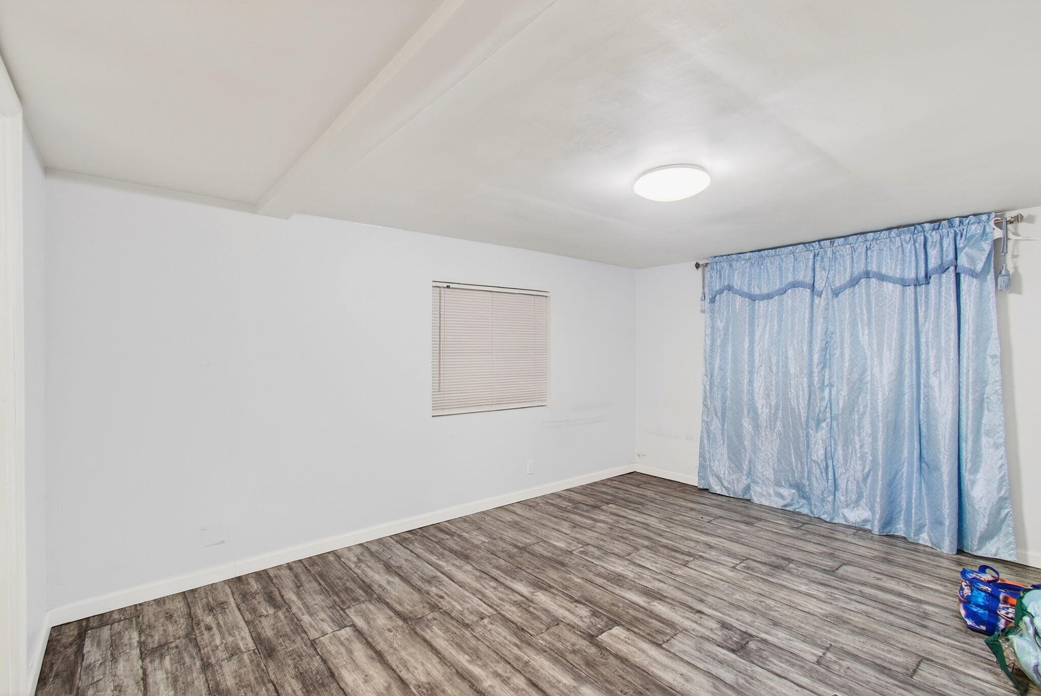 22849 Tradewind Road Boca Raton, FL 33428 - Photo 24 of 60 a view of a room with wooden floor