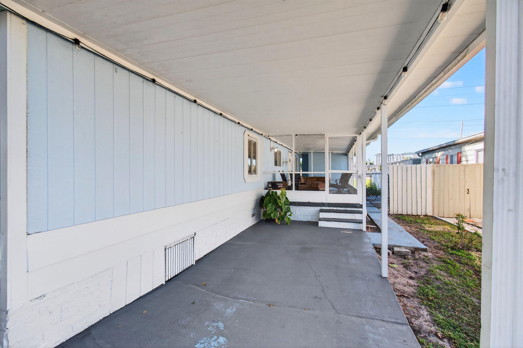 22849 Tradewind Road Boca Raton, FL 33428 - Photo 49 of 60 a view of a porch with seating space