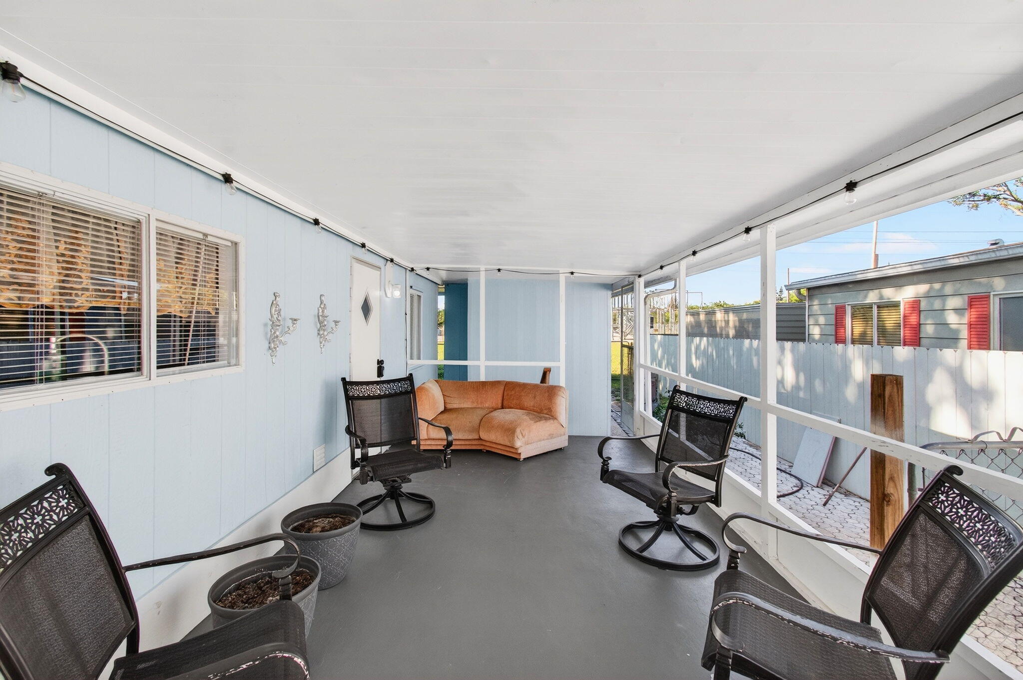 22849 Tradewind Road Boca Raton, FL 33428 - Photo 50 of 60 a view of a livingroom with workspace and a window