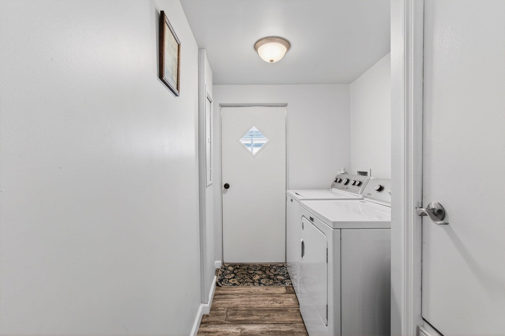 22849 Tradewind Road Boca Raton, FL 33428 - Photo 5 of 60 a bathroom with a sink and mirror with toilet