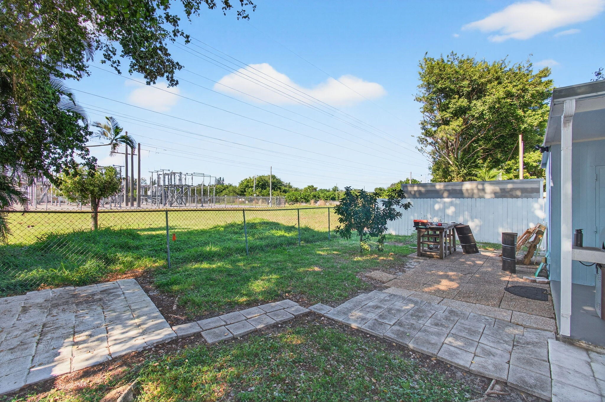 22849 Tradewind Road Boca Raton, FL 33428 - Photo 57 of 60 a view of a park with plants and a bench