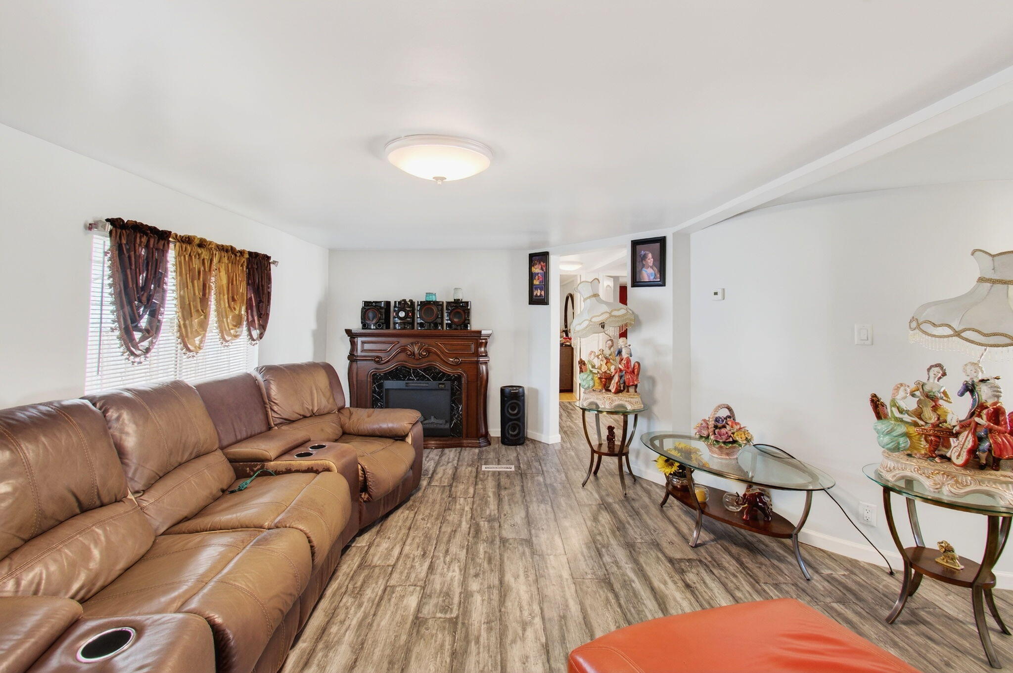 22849 Tradewind Road Boca Raton, FL 33428 - Photo 8 of 60 a living room with furniture and wooden floor