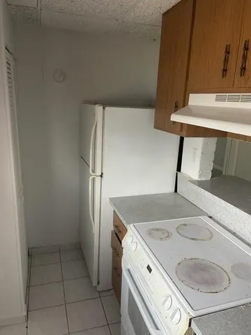a view of bathroom with a sink and a mirror