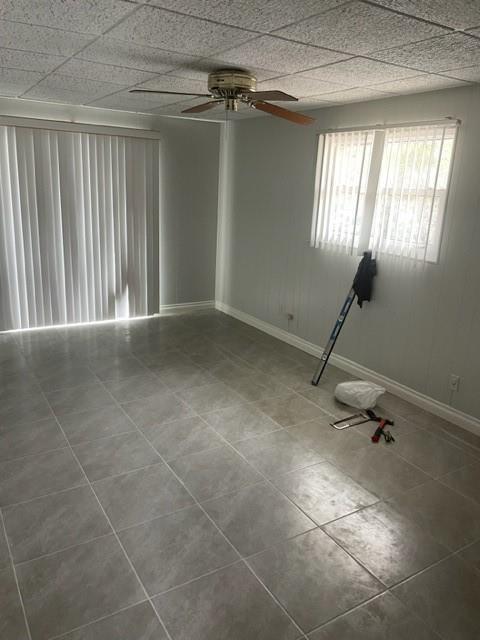 1901 Pierce Street, Unit 7 Hollywood, FL 33020 - Photo 10 of 11 a view of an empty room with windows