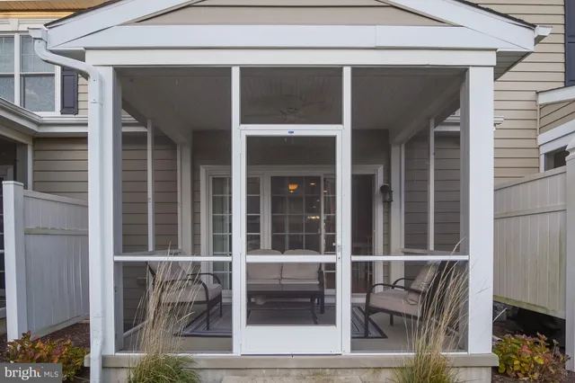 a view of house with chair and tables