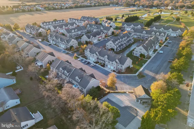 a view of a lake with a building in the background