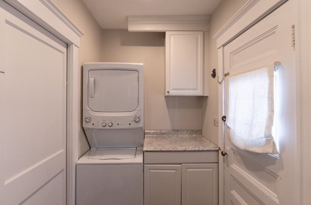 1000 South Street Boston, MA 02131 - Photo 11 of 22 a utility room with dryer and washer