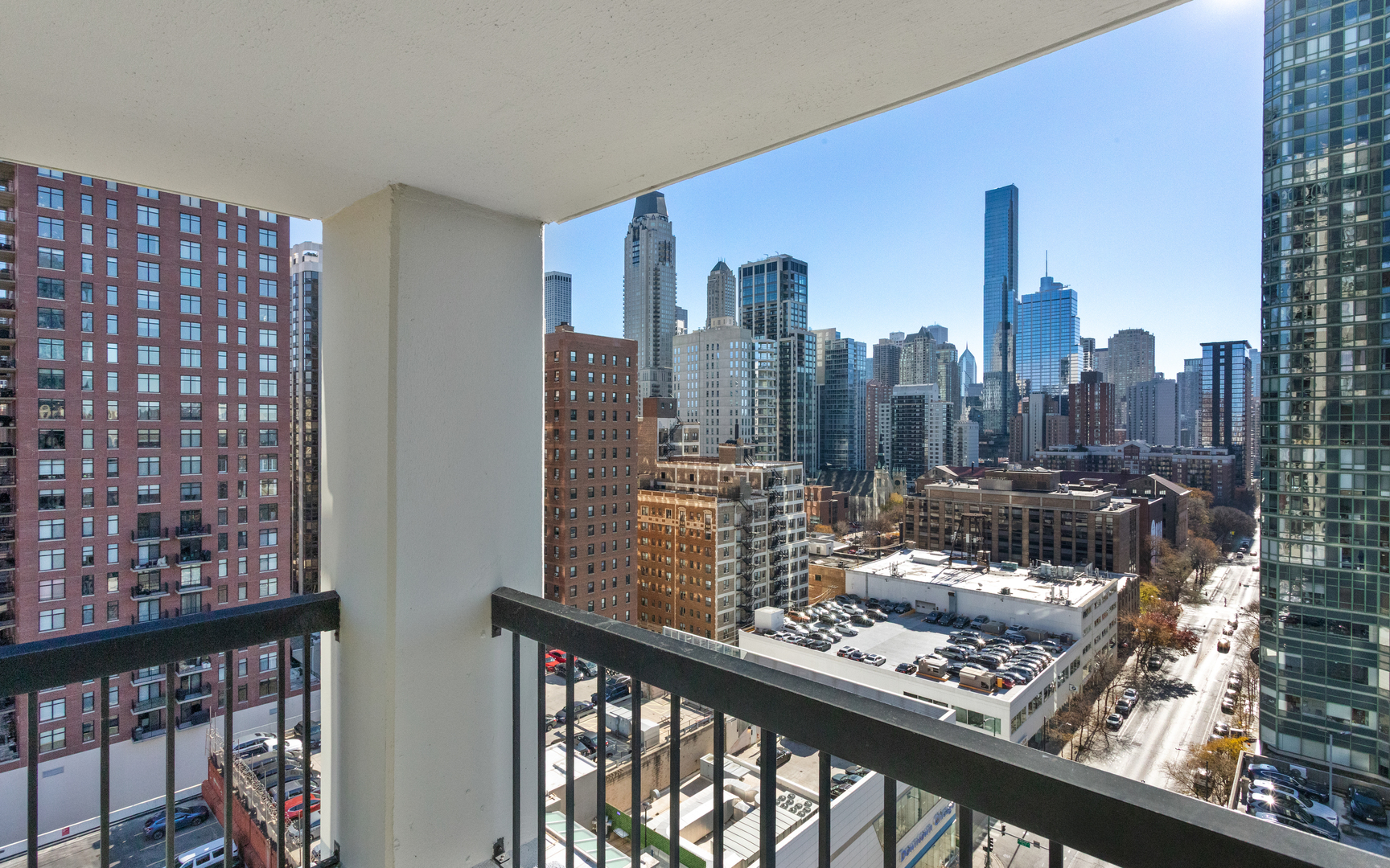 1122 North Clark Street, Unit 1808 Chicago, IL 60610 - Photo 20 of 31 a city view from a balcony with city view
