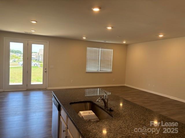 7136 Maple Run Circle Charlotte, NC 28215 - Photo 25 of 39 an empty room with wooden floor and windows
