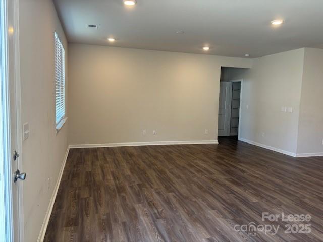 7136 Maple Run Circle Charlotte, NC 28215 - Photo 28 of 39 an empty room with wooden floor and entrance