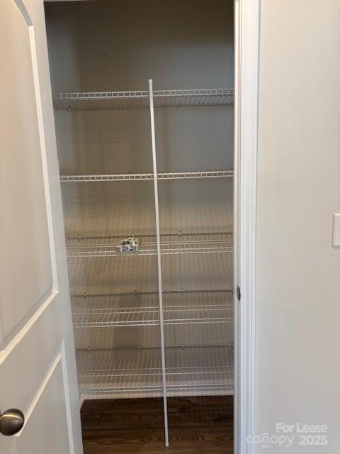 7136 Maple Run Circle Charlotte, NC 28215 - Photo 3 of 39 a bathroom with a glass shower door