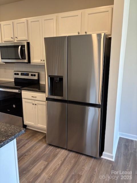 7136 Maple Run Circle Charlotte, NC 28215 - Photo 31 of 39 a white refrigerator freezer sitting in a kitchen