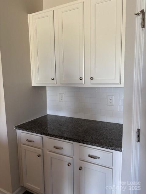 7136 Maple Run Circle Charlotte, NC 28215 - Photo 36 of 39 a kitchen with granite countertop white cabinets and white appliances
