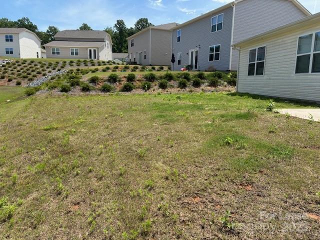 7136 Maple Run Circle Charlotte, NC 28215 - Photo 39 of 39 a front view of a house with a yard