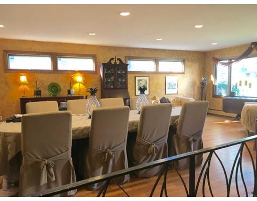 25 Auburndale Road Marblehead, MA 01945 - Photo 3 of 9 a view of a dining room with furniture window and outside view
