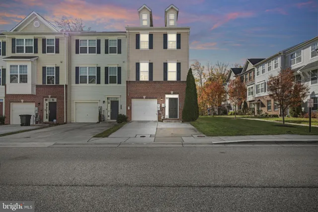 a view of a building with a yard