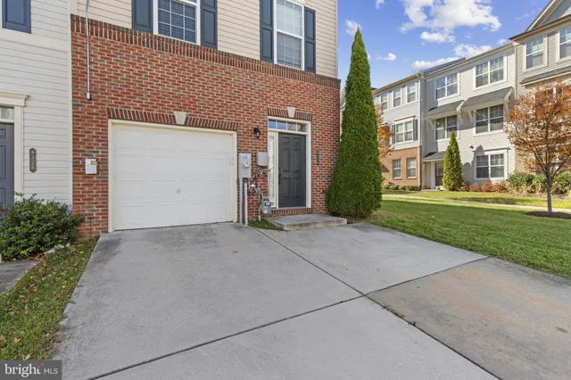 a view of a building with a yard