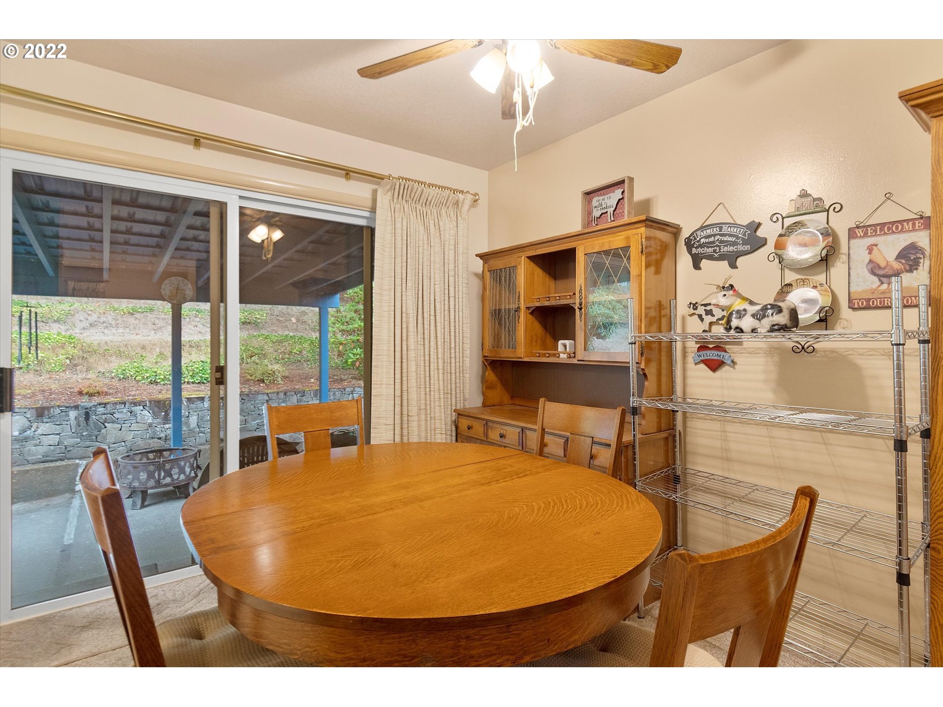 75389 Fern Hill Road Rainier, OR 97048 - Photo 5 of 15 a balcony with table and chairs