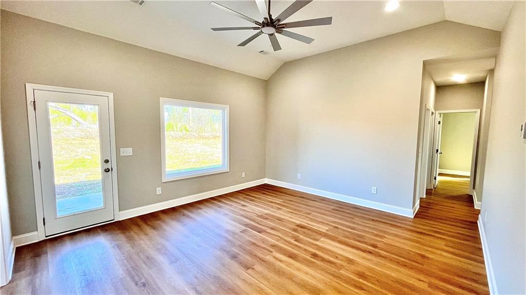 23 S Road Griffin, GA 30224 - Photo 5 of 32 a view of room with window and wooden floor