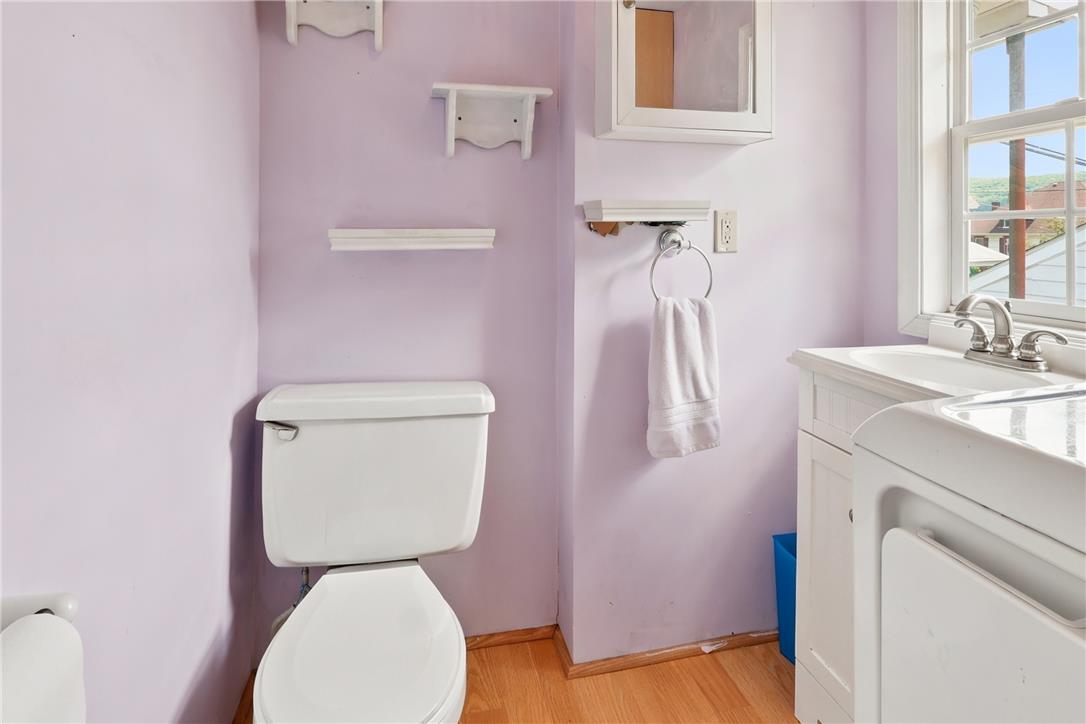 803 Spring Street Bethlehem, PA 18018 - Photo 15 of 34 A compact and functional bathroom features a single window, providing natural light.