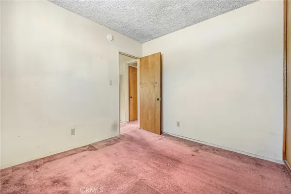 an empty room with an entryway