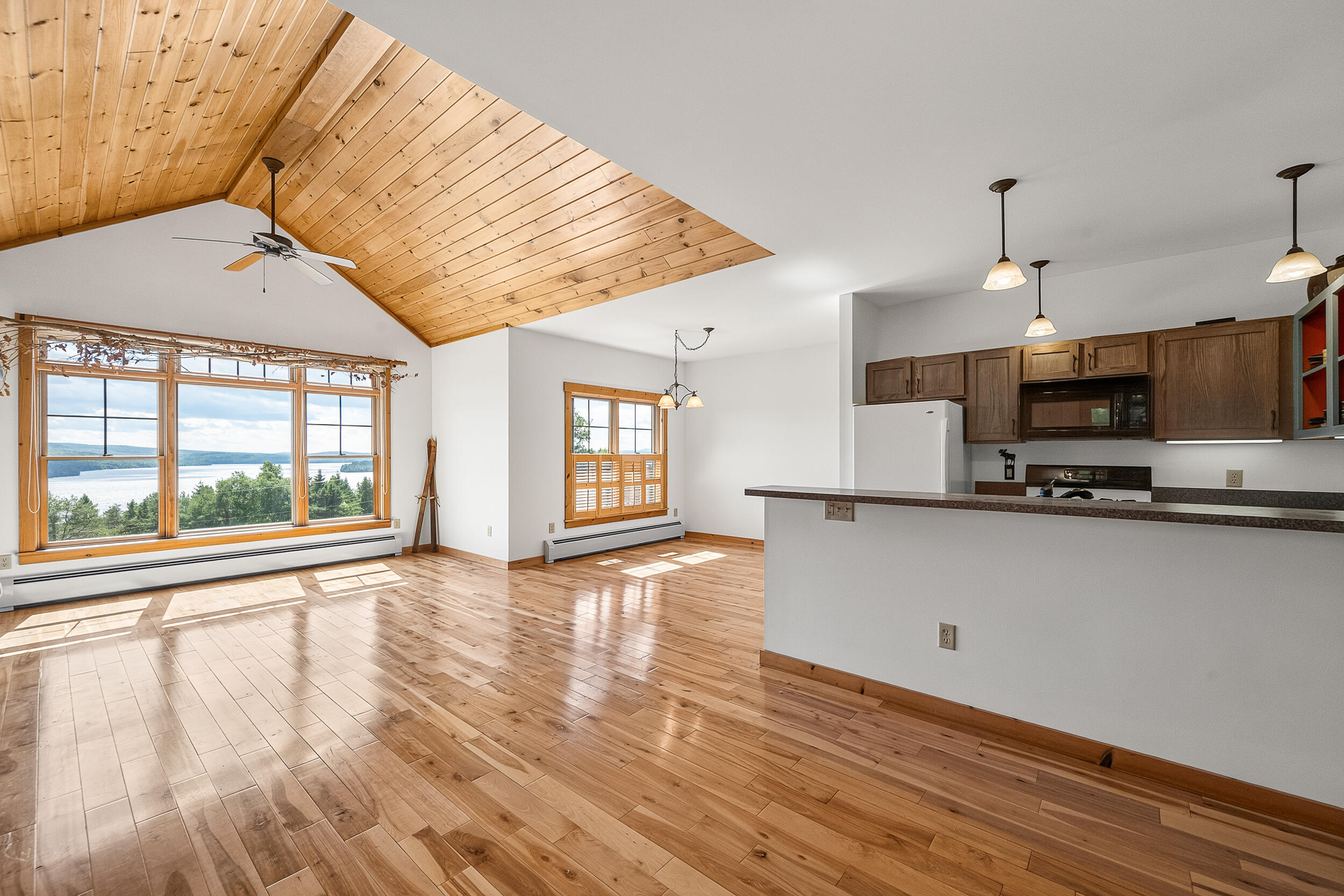 11 Whip Willow Farm Road, Unit 4 Rangeley, ME 04970 - Photo 3 of 35 Living Room and View